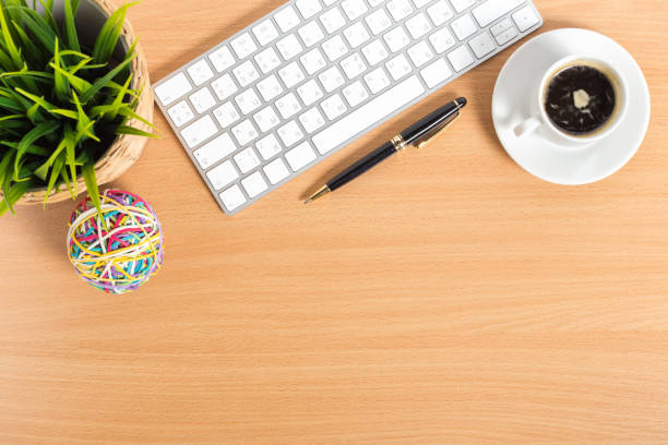 istock working place at wooden desktop with coffee 1160914262