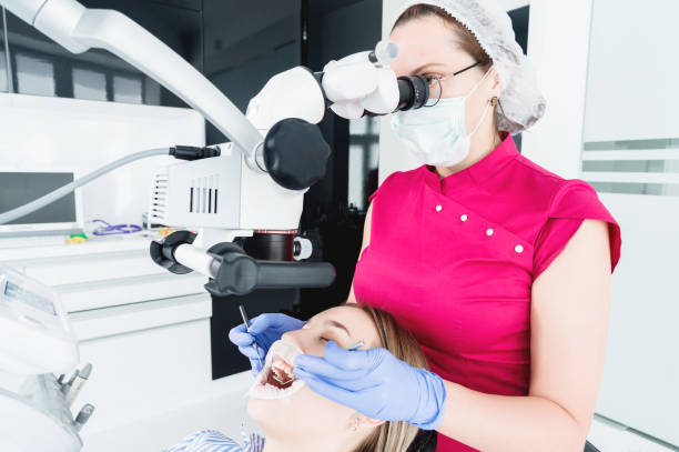 istock A female professional dentist examines a female patient with a stamotologic microscope in her office 1160919097