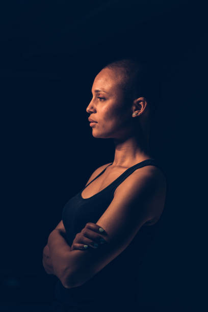 istock Shaved hair woman with a strong attitude 1160922041