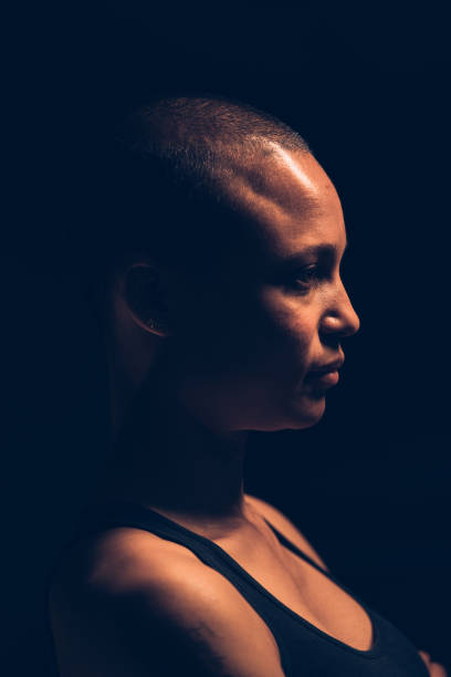 istock Shaved hair woman with a strong attitude 1160922044