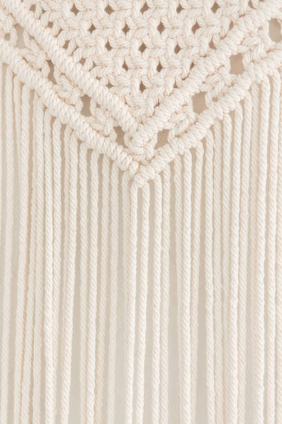 istock Close up of handmade cotton macrame panel. Texture. Background. 1160926408