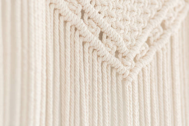 istock Close up of handmade cotton macrame panel. Texture. Background. 1160926411