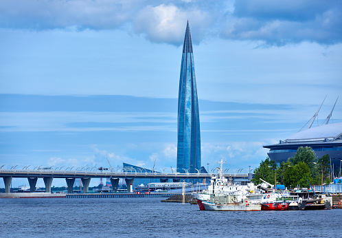 St. Petersburg, Russia - June 19, 2018: Modern bridge and stadium at city harbor, St. Petersburg, Russia.