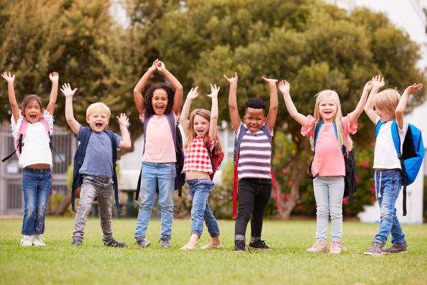 istock Excited Elementary School Pupils On Playing Field At Break Time 1160929088