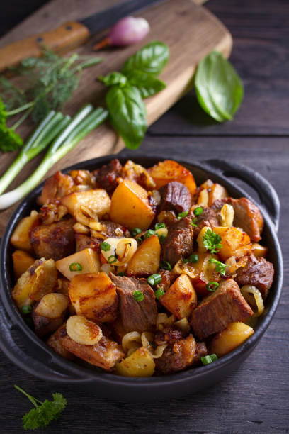istock Fried beef and  potatoes with onions and garlic 1160930727