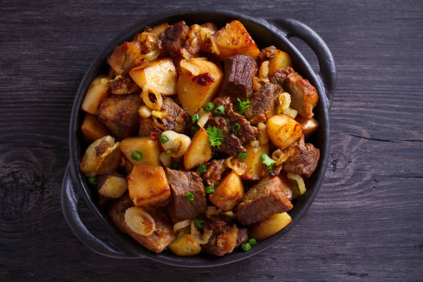 istock Fried beef and  potatoes with onions and garlic 1160932629