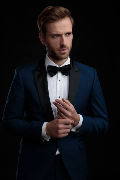 istock Concerned groom playing with his hands and looking sideways 1160932997
