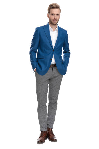 istock Confident businessman holding both hands in his pockets 1160933019