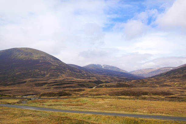 The Cairngorm mountains near Dalwhinnie in Scotland View over the mountains of the Cairngorm National park next to the A9 cairngorm mountains stock pictures, royalty-free photos & images