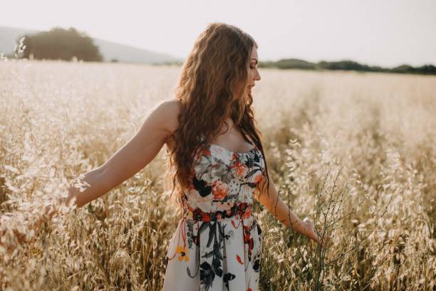 istock Girl in the field 1160938189