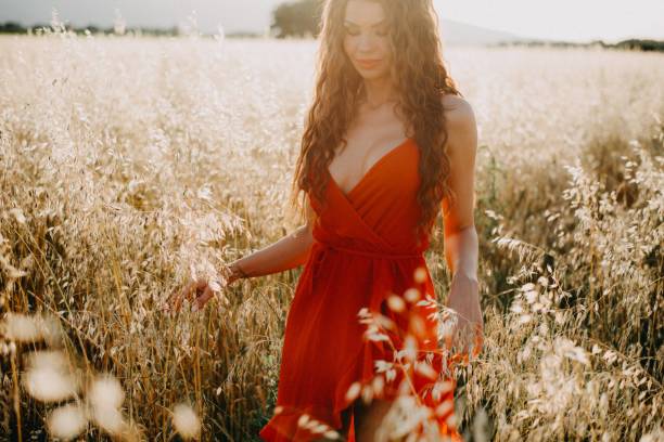 istock Girl in the field 1160938270