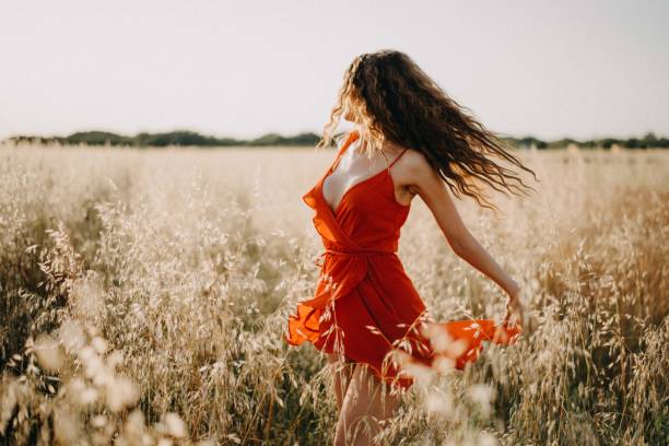 istock Girl in the field 1160938314