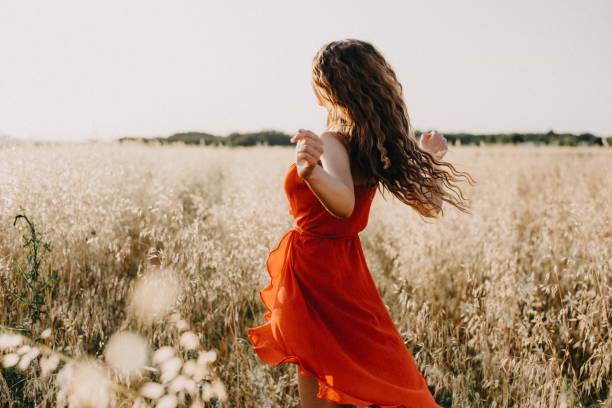 istock Girl in the field 1160938361
