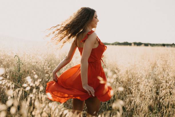 istock Girl in the field 1160938417