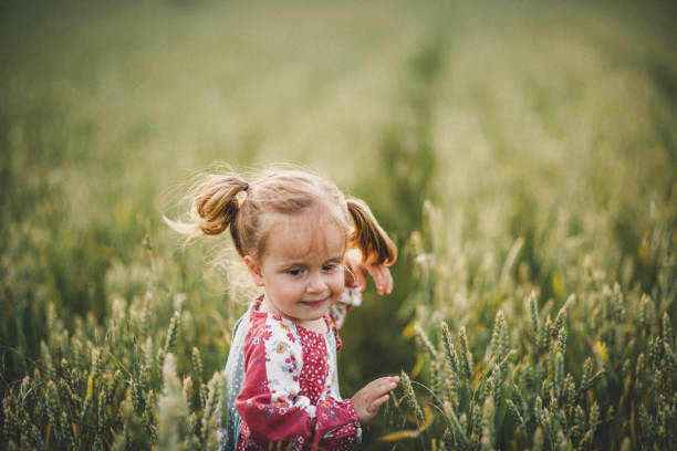 istock Happy girl in meadow 1160939552