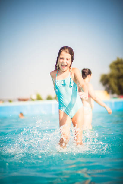 istock Laugh and the pool perfectly fun. 1160945836