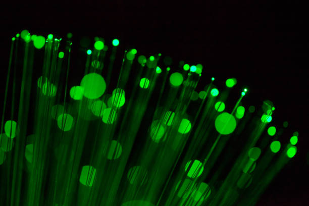 istock Fiber optic, glare in the focus. Abstract futuristic background 1160946466