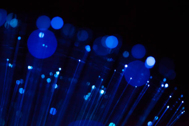 istock Abstract spherical background, optical fiber blue luminous dots and lines 1160946472