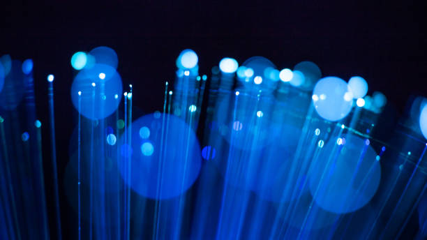 istock Fiber optic, glare in the focus. Abstract futuristic background 1160946493