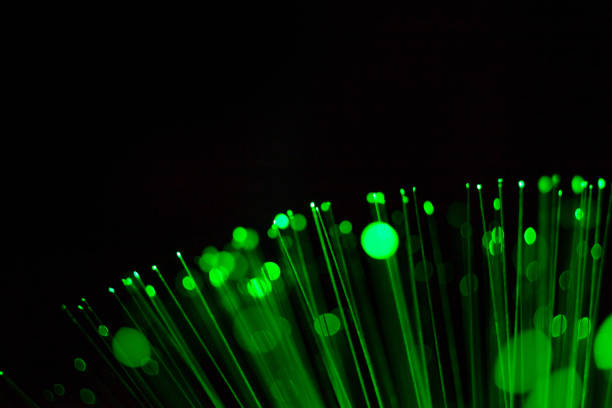istock Fiber optic, glare in the focus. Abstract futuristic background 1160946506