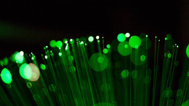 istock Fiber optic, glare in the focus. Abstract futuristic background 1160946517