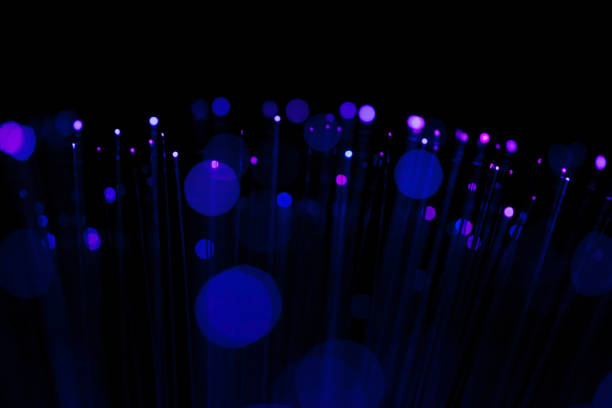 istock Fiber optic, glare in the focus. Abstract futuristic background 1160946542