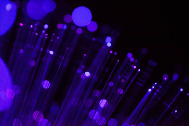 istock Fiber optic, glare in the focus. Abstract futuristic background 1160946552