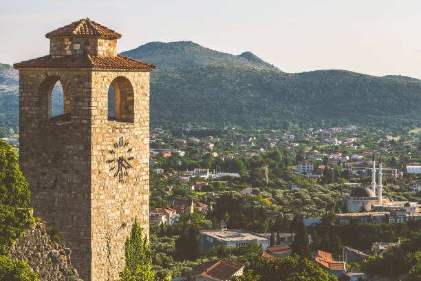 istock Tower clock in old town Bar in Montenegro. 1160947213