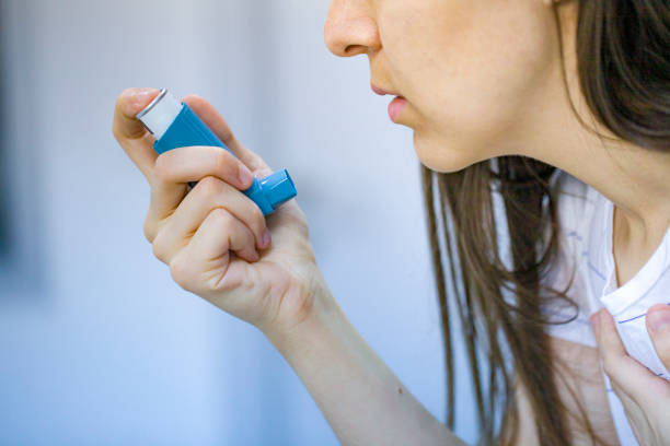 istock Woman use Asthma part to relaxing 1160950661