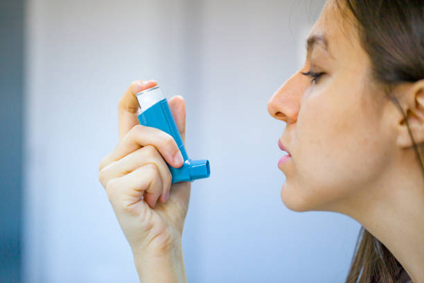 istock Woman use Asthma part to relaxing 1160950685