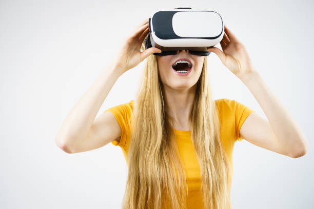 istock Girl wearing virtual reality goggles. 1160952055
