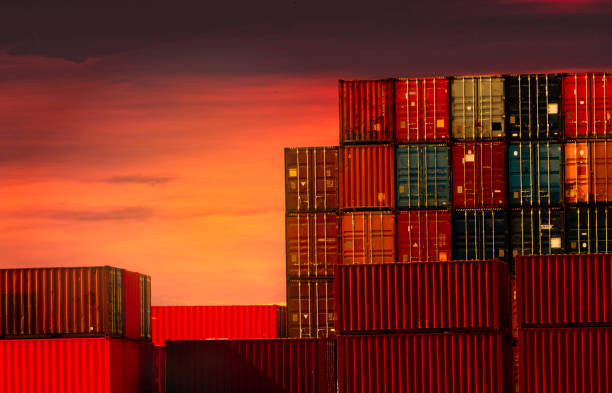 Container logistic. Cargo and shipping business. Container ship for import and export logistic. Container freight station. Logistic industry from port to port. Container at harbor for truck transport.
