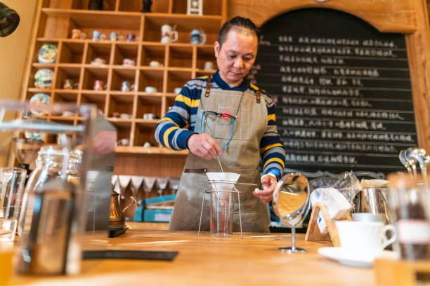 istock Asian coffee shop owner preparing fresh coffee 1160962277