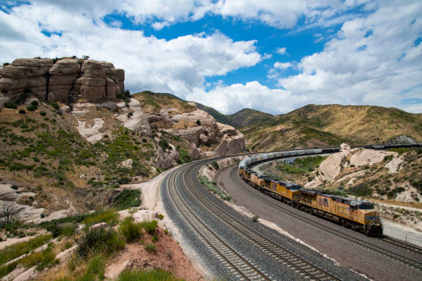 Cajon 2 5-20-2019 Union Pacific Railroad freight train on Sullivan's Curve, descending Cajon Pass, California.
Cajon Junction, California.
May 20, 2019 robertmichaud stock pictures, royalty-free photos & images