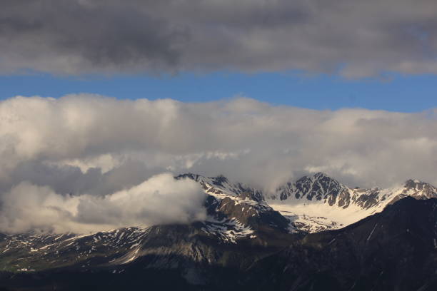 Aroser Rothorn seen from Obermutten, Switzerland. Cloudy summer day.