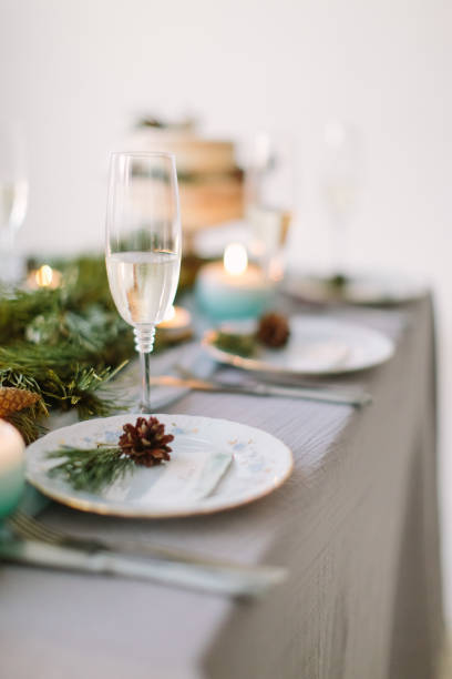 istock Wedding table with plates and wedding cake, wedding decor, flowers, blue and green decor, candles 1160963413