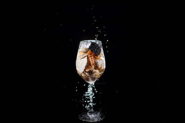 istock The glass with seashells stand on the table 1160963627