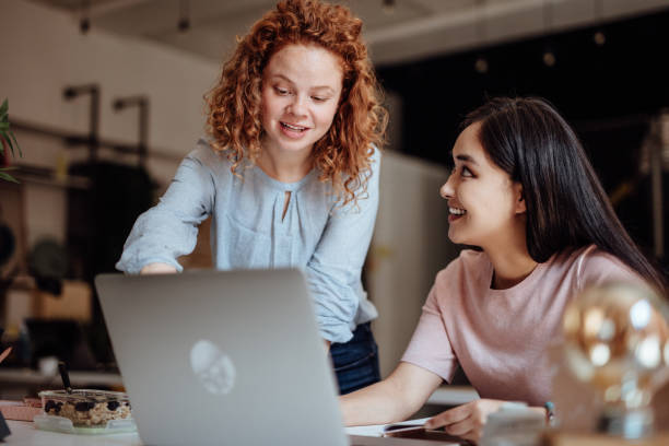 istock Two Businesswomen Working On Computer In Office 1160963883
