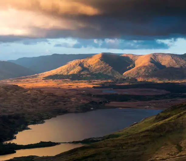 Kylemore Lough is a freshwater lake in the west of Ireland. It is located in the Connemara area of County Galway, Ireland. Image taken at sunset from the summit of Diamond Hill