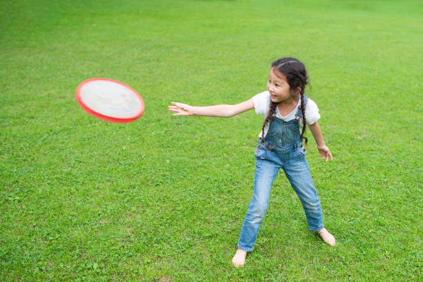 Girl playing with frisbee