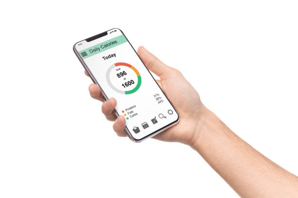 istock Man holding smartphone with counting calories application 1160967780