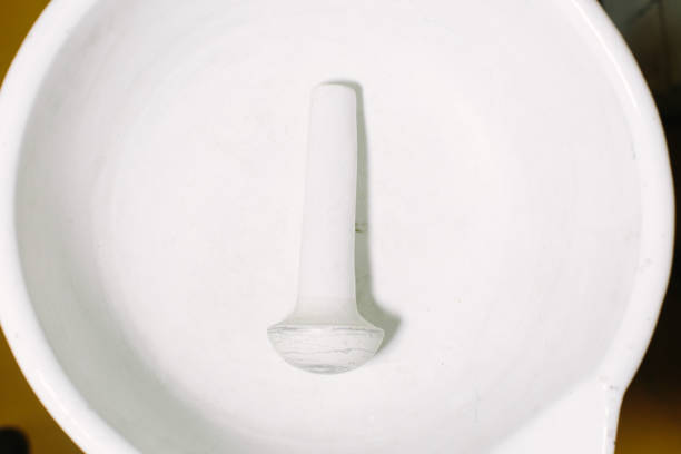 istock Pharmacy white porcelain mortar and pestle set 1160968055
