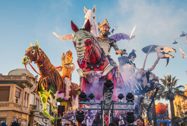 Viareggio parade of carnival floats on streets of Viareggio, Italy. VIAREGGIO, ITALY: FEB. 23, 2019 The parade of carnival floats on streets of Viareggio, Italy. Carnival of Viareggio is considered one of the most important carnivals in Italy. allegory painting stock pictures, royalty-free photos & images