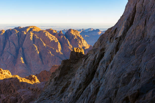 istock Beautiful view from the mountain. Panorama. Mountain range with visible silhouettes through the morning blue fog 1160969246