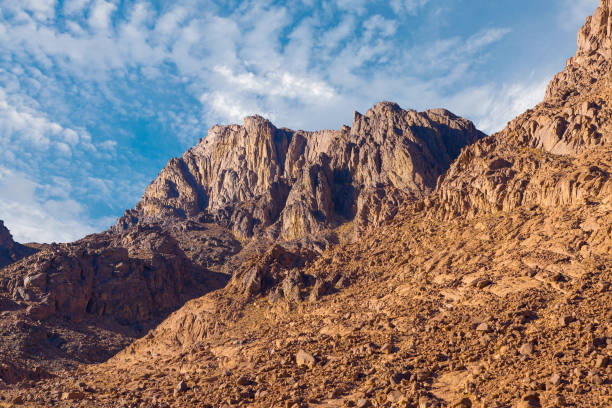 istock Beautiful view from the mountain. Panorama. Mountain range with visible silhouettes through the morning blue fog 1160969335