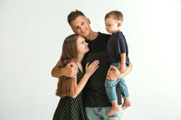 istock Young family spending time together and smiling 1160969544