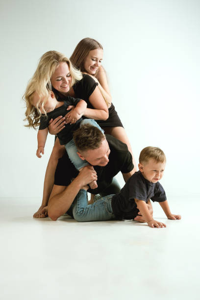 istock Young family spending time together and smiling 1160969556