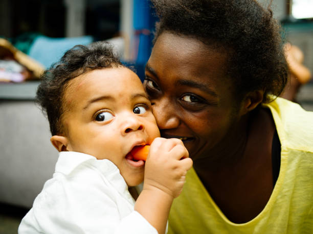 istock Young African mother with her baby boy. 1160972913