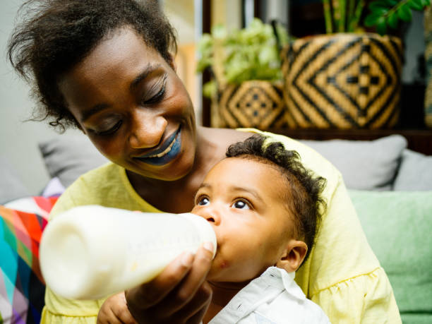istock Young African mother with her baby boy. 1160973658