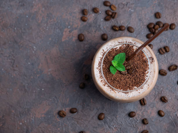 istock Chocolate smoothie with coffee, cocoa and milk sprinkled with chocolate chips 1160975529